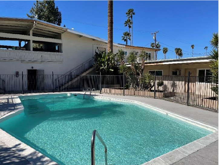 courtyard and pool of garden apartment complex in riverside california