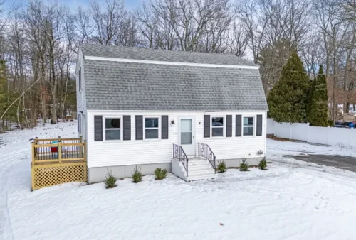 A New Hampshire fix and flip property in the snow, financed by Lima One Capital.