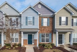 Residential real estate homes with blue sky in the background