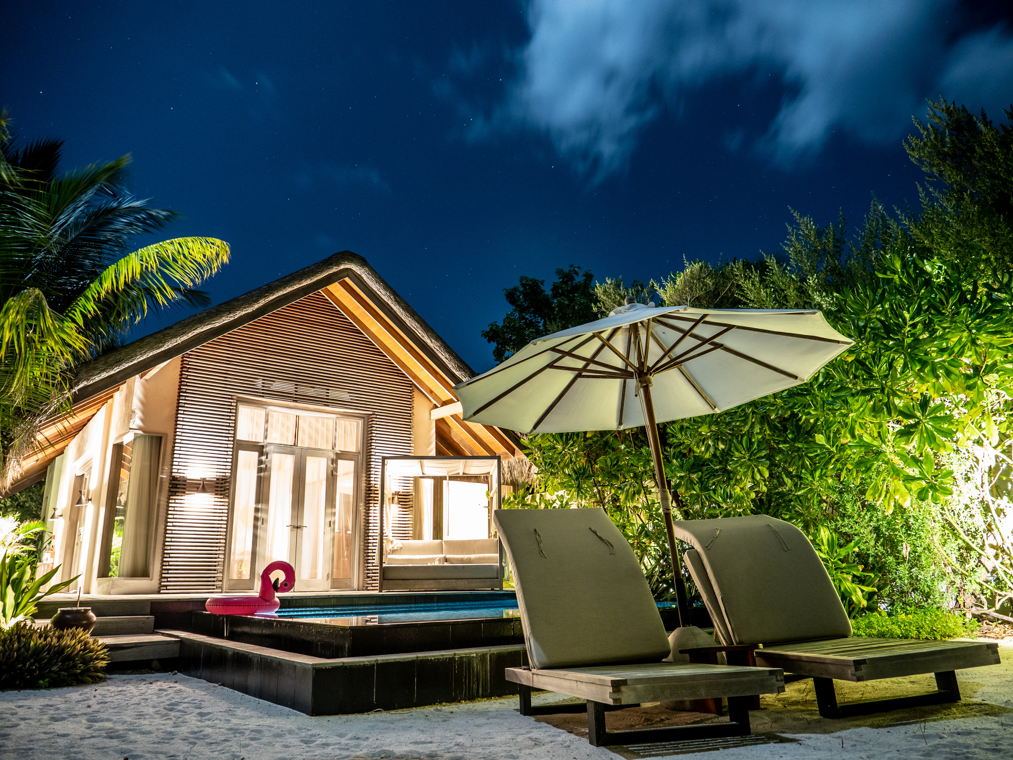 Luxury beach villa at night