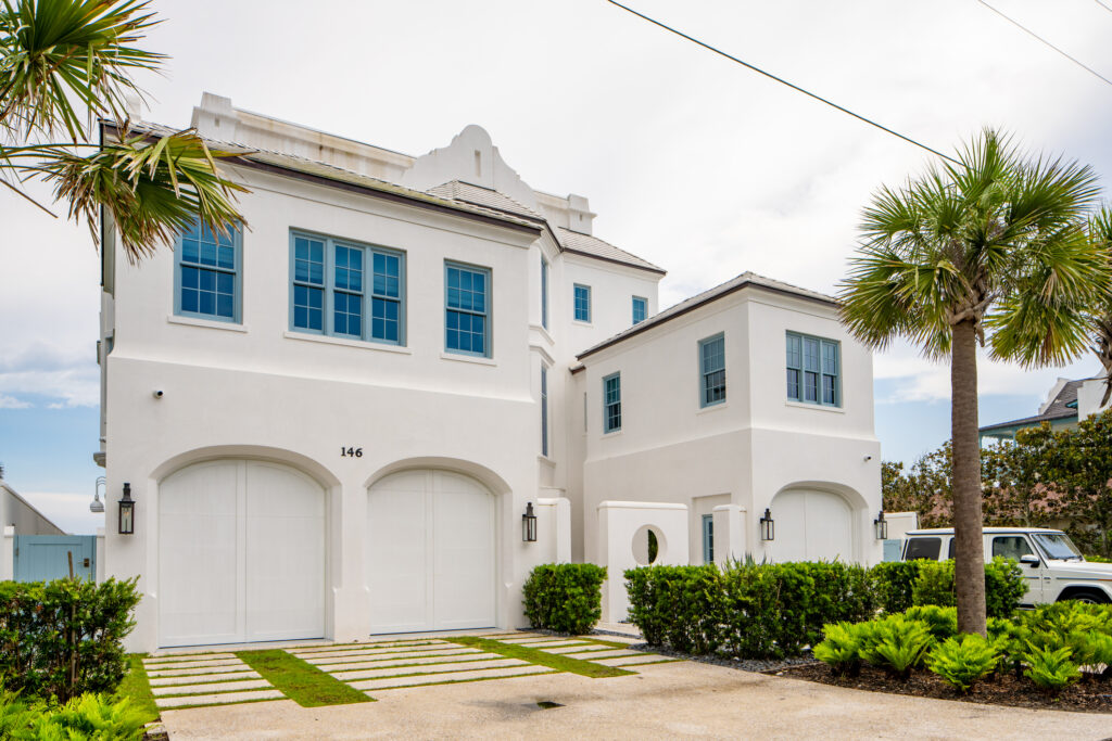 A side shot of a large white vacation rental