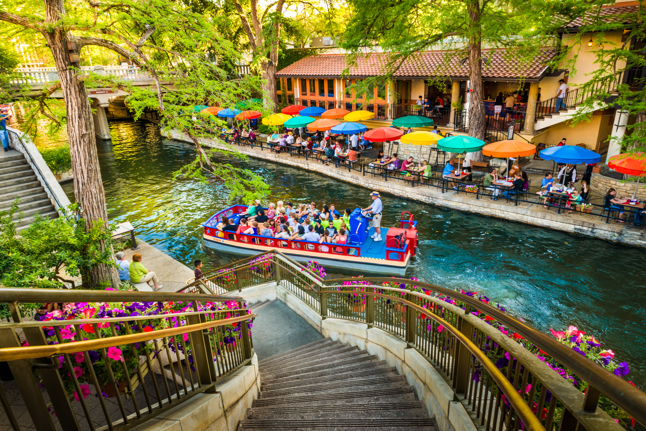 The riverwalk, San Antonio park walkway scenic canal tour boat
