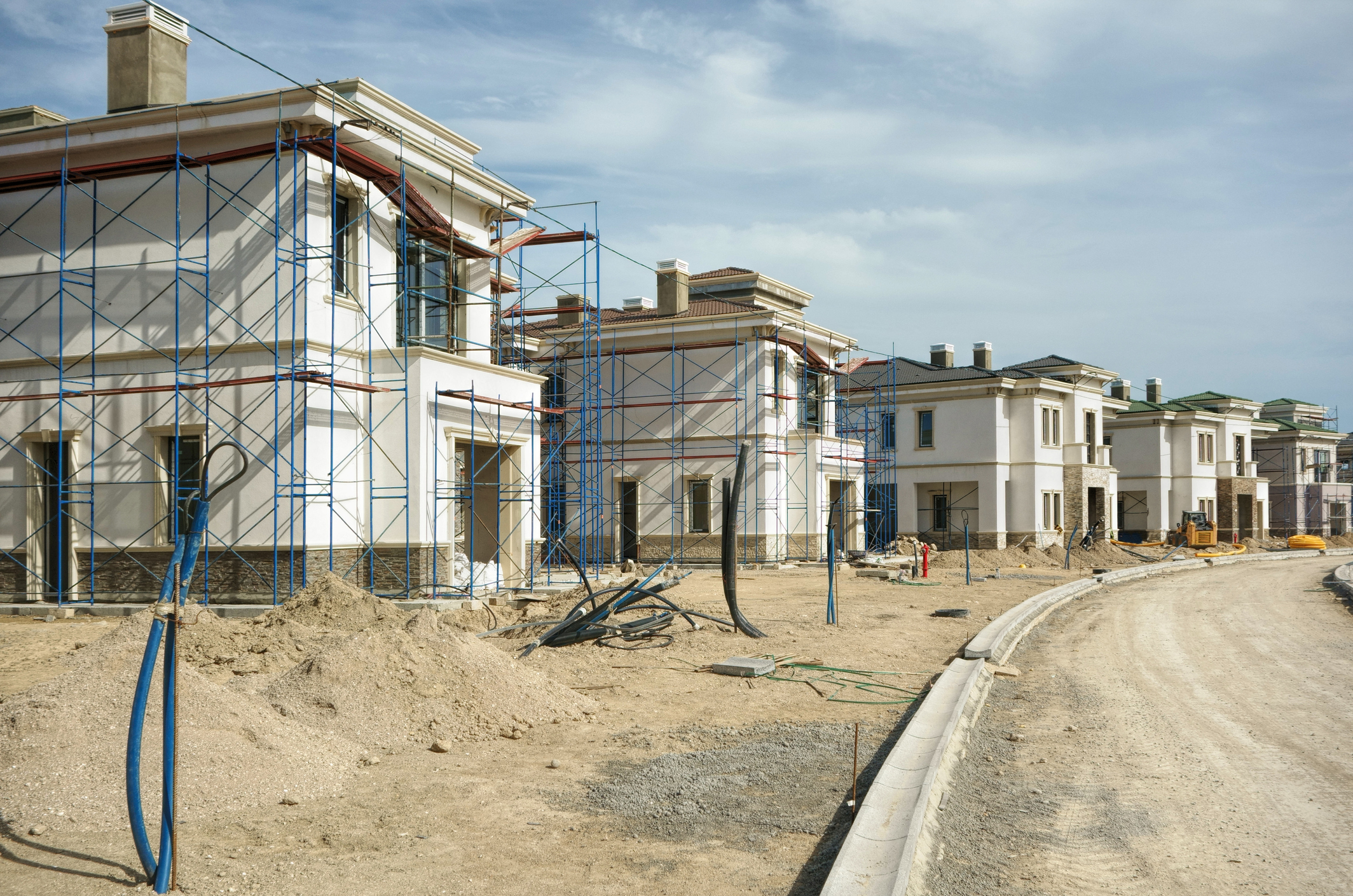 Photo of a neighborhood of houses under construction