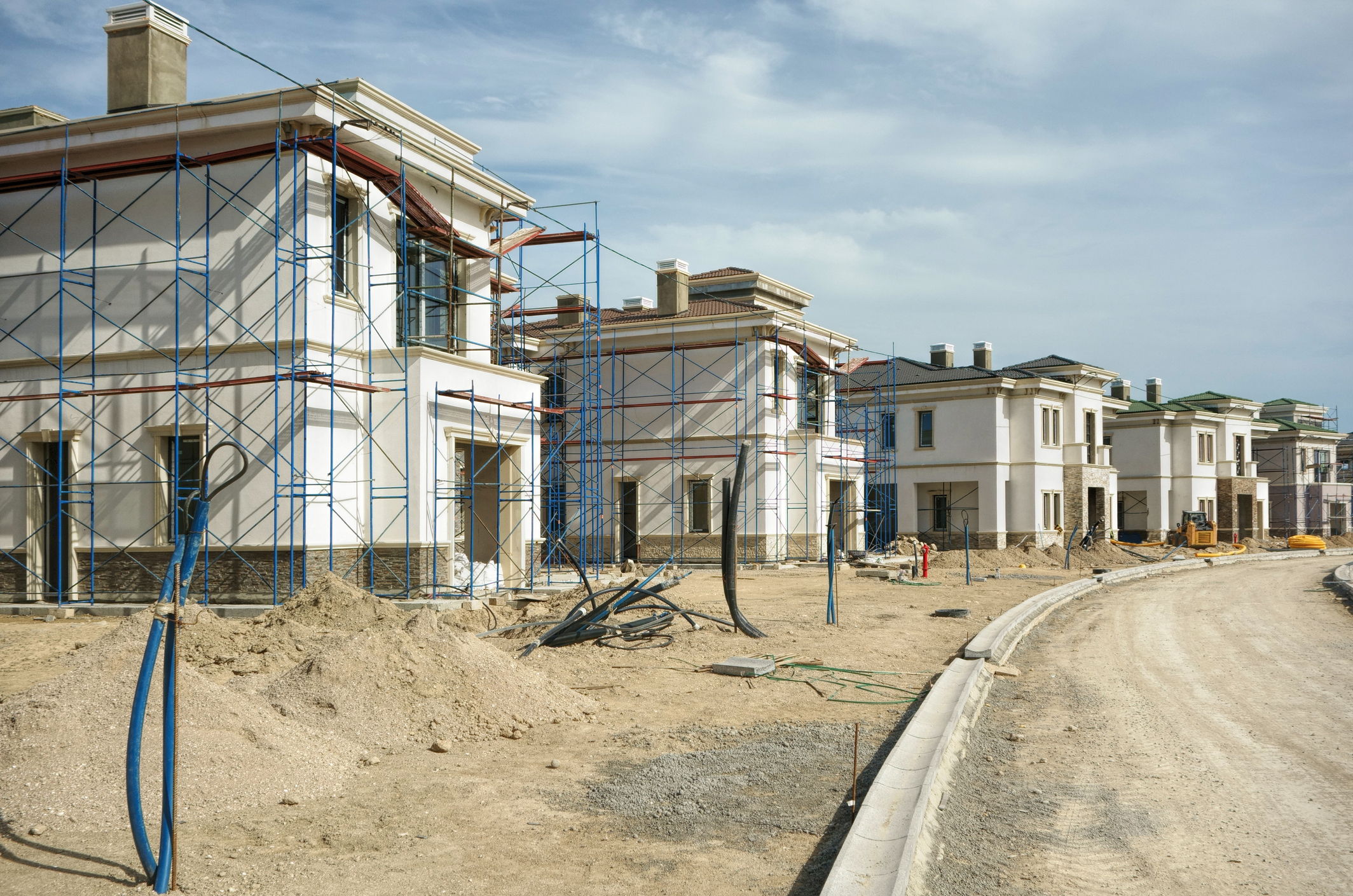 constructing quality homes Photo of a neighborhood of houses under construction