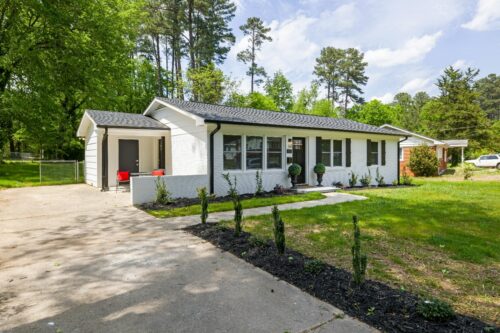 White and black home - Fix and Flip vs Buy and Hold